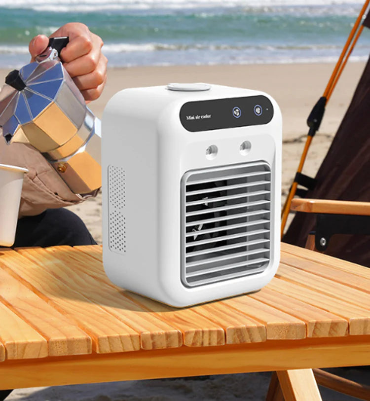 Aire acondicionado portátil mini con función de enfriamiento y humidificación.